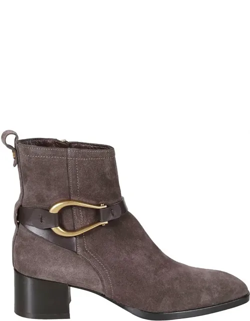 Rich Brown Leather Boots With Classic Silhouettes