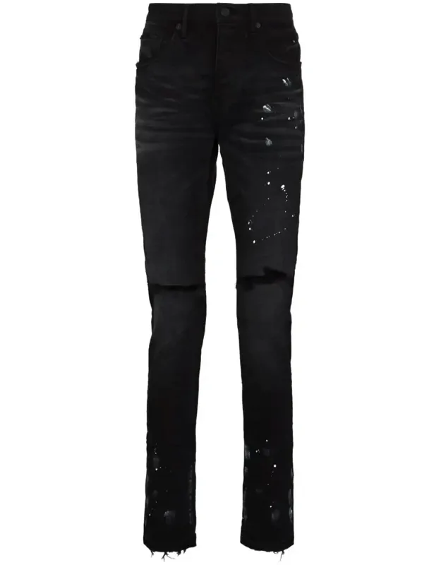 Jeans With Ripped Detailing And Paint Splatter
